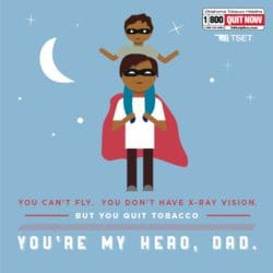 E-Card: You can't fly. You don't have x-ray vision. But you quit tobacco. You're my hero, dad. With image of dad with cape and son on his shoulders.