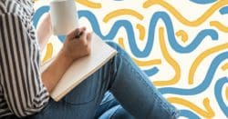 Person drinking tea and journaling