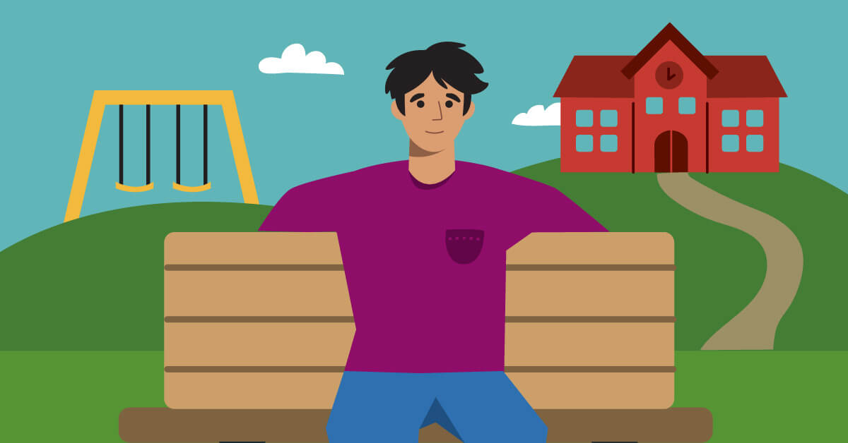 Illustration of a smiling man in a purple shirt on a park bench, with a swing set on one side and a red schoolhouse on a hill behind him.